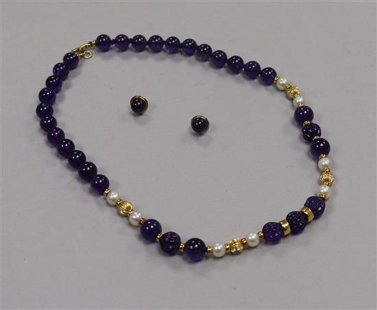 An 18ct gold, amethyst and cultured pearl bead necklace and a pair of 9ct gold amethyst ear studs (no butterflies). necklace 44cm.